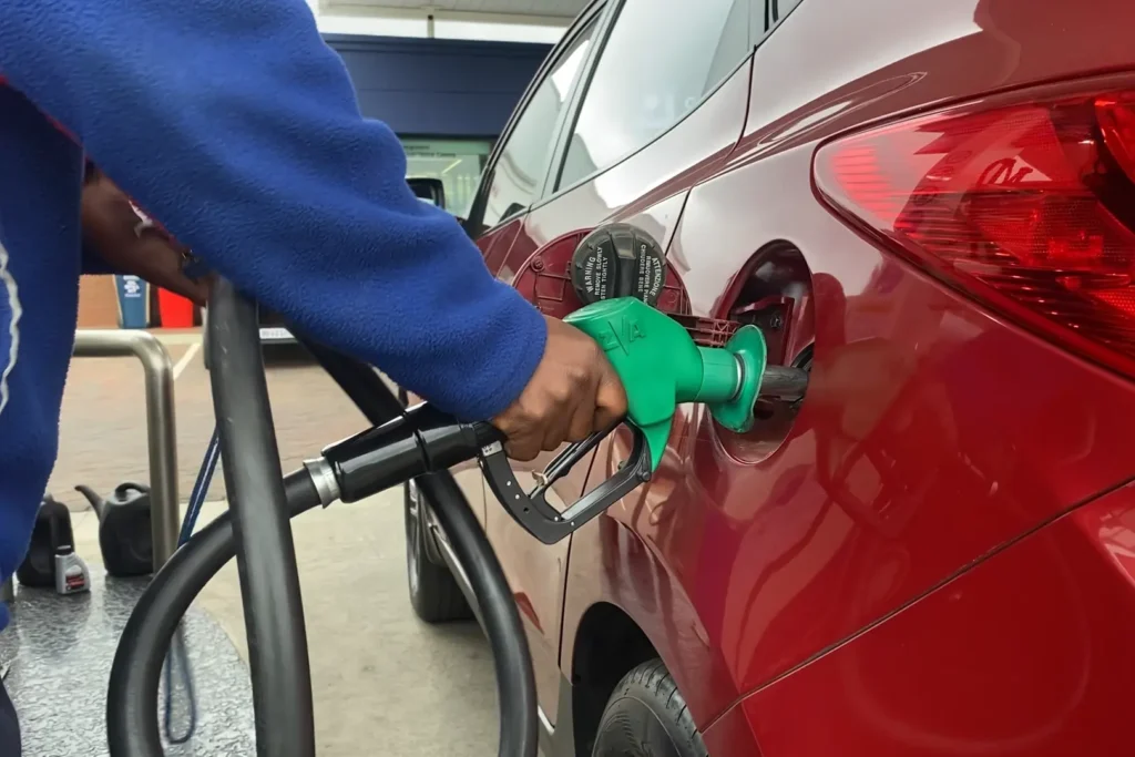 retail fuel station Kempton Park fuel pump service with attendant refuelling vehicle at completed forecourt