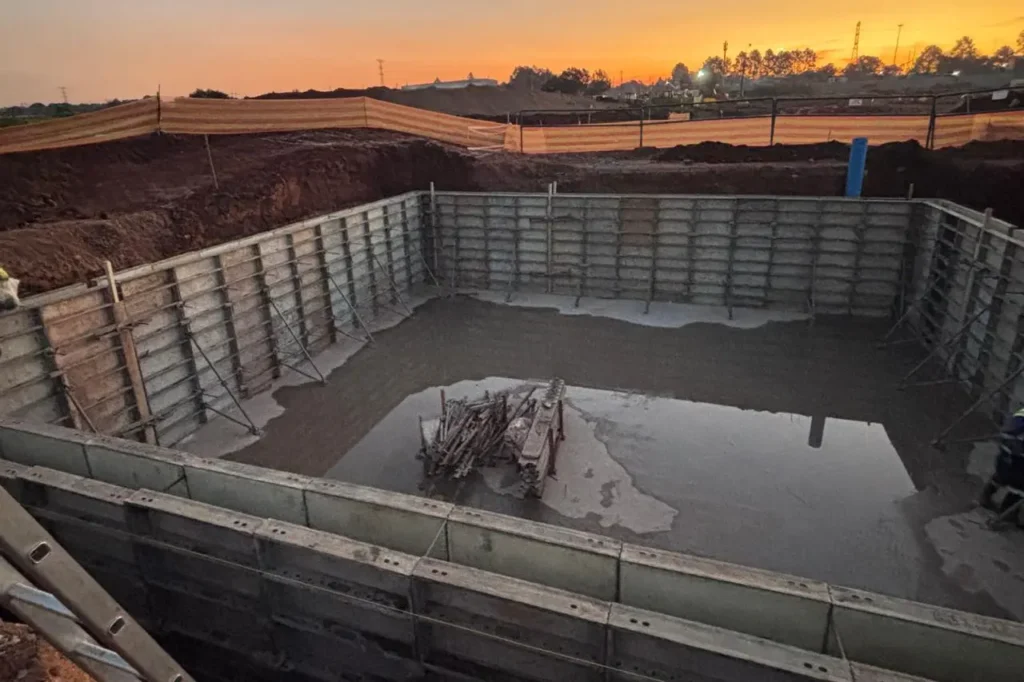 retail fuel station Kempton Park tank farm chamber construction with concrete base and temporary formwork