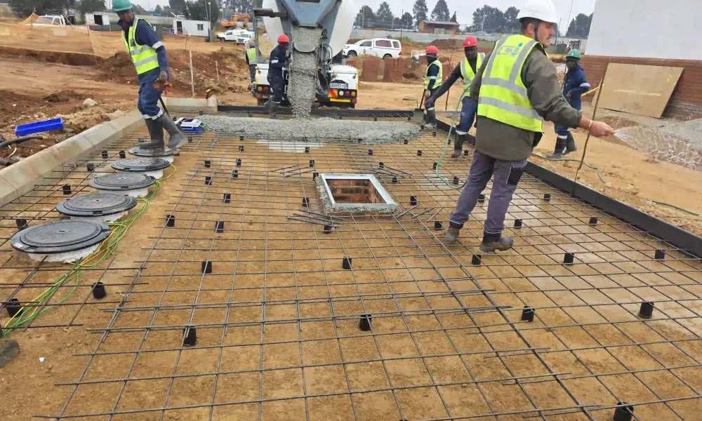 retail fuel station Kempton Park canopy structure and forecourt progress with construction teams on site