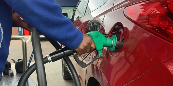 retail fuel station Kempton Park fuel pump service with attendant refuelling vehicle at completed forecourt