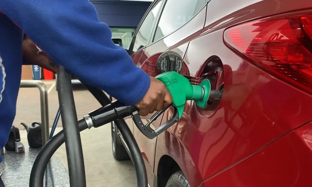 retail fuel station Kempton Park fuel pump service with attendant refuelling vehicle at completed forecourt